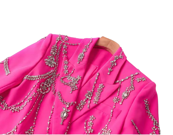 A tailored blazer dress embellished with sparkling rhinestones