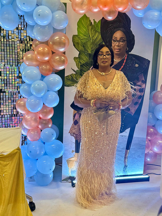 Golden Beaded Mermaid Evening Gown with Feather Detail