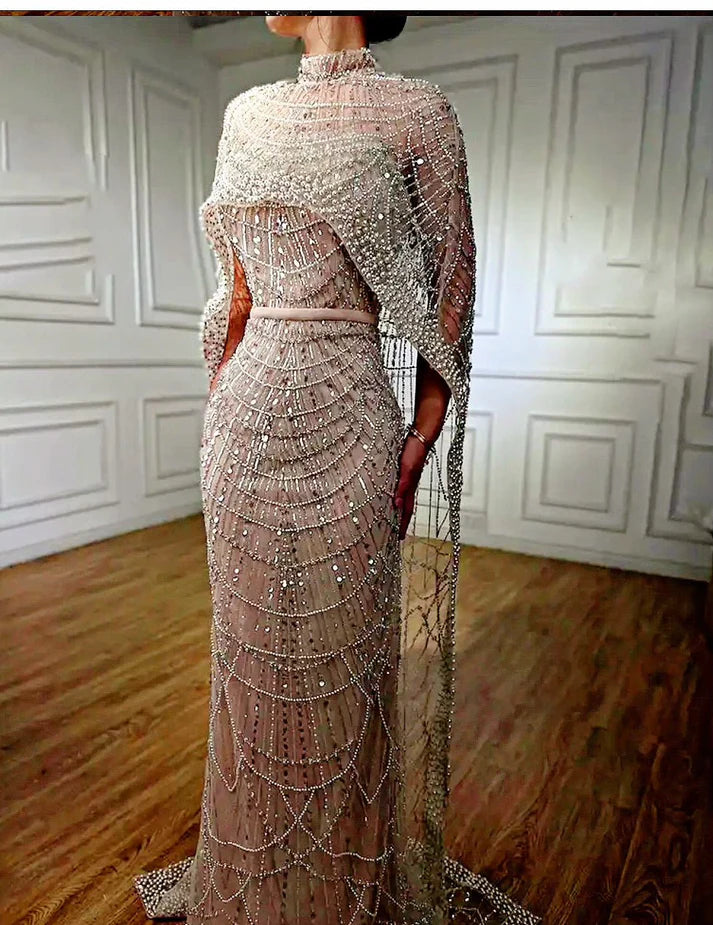 Embellished drop cape dress