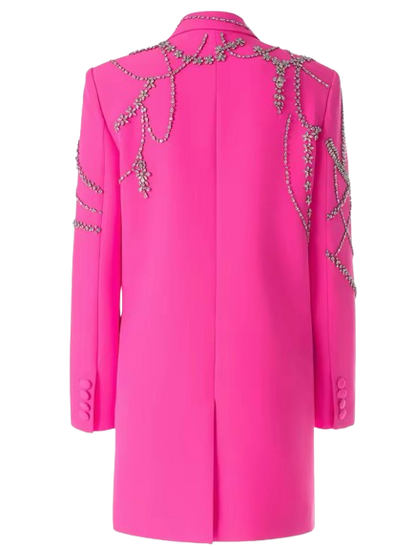 A tailored blazer dress embellished with sparkling rhinestones